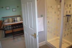 The comfortable double room and en-suite shower